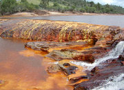 The red appearance of this water is due to iron in the rocks